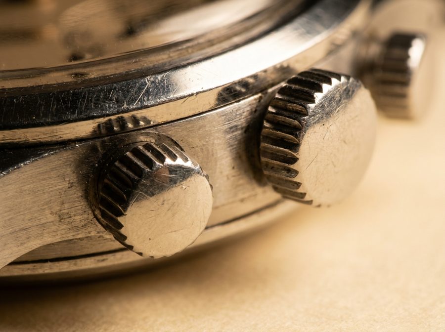 Forensic macro of an unpolished steel Patek Philippe Reference 1463 chronograph